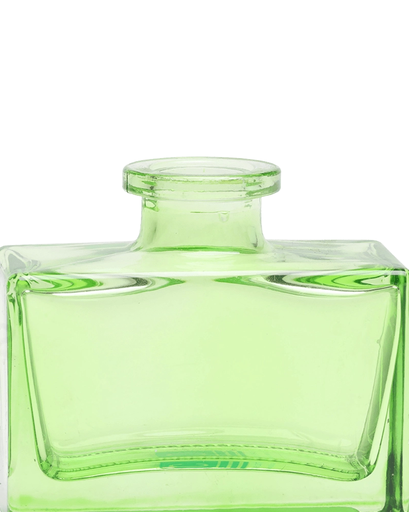 Chive Loft square glass bud vase in green, close-up on the narrow neck and thick glass base.