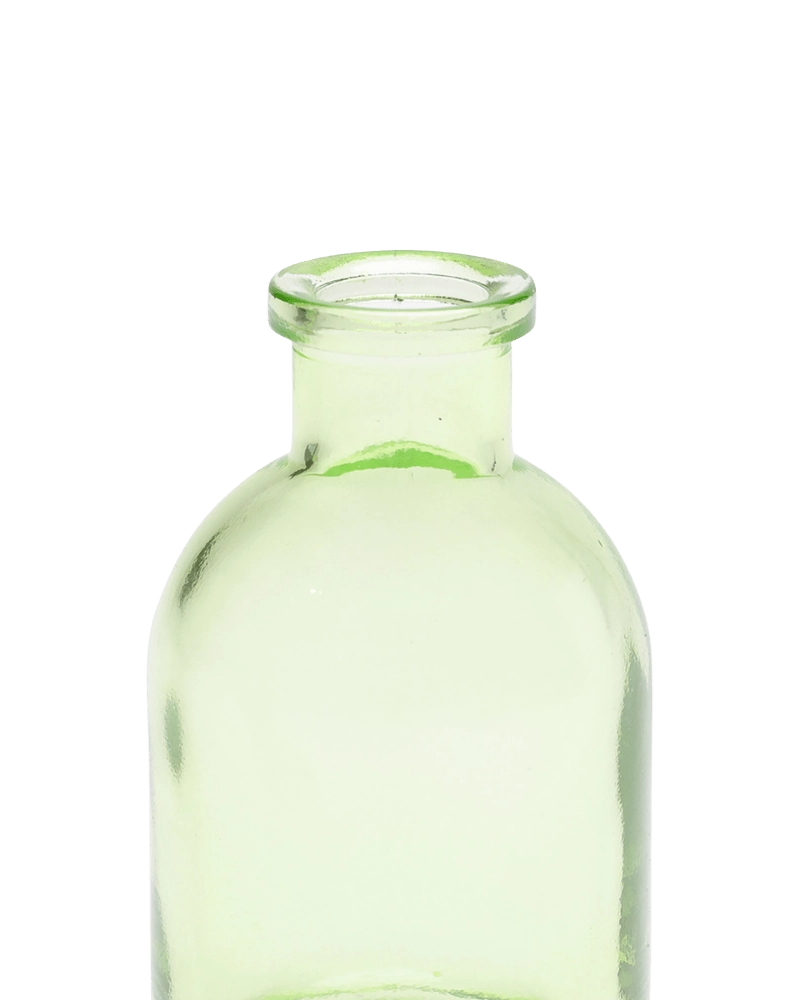 Chive Loft tall glass bud vase in green, close-up on the narrow neck and rim.