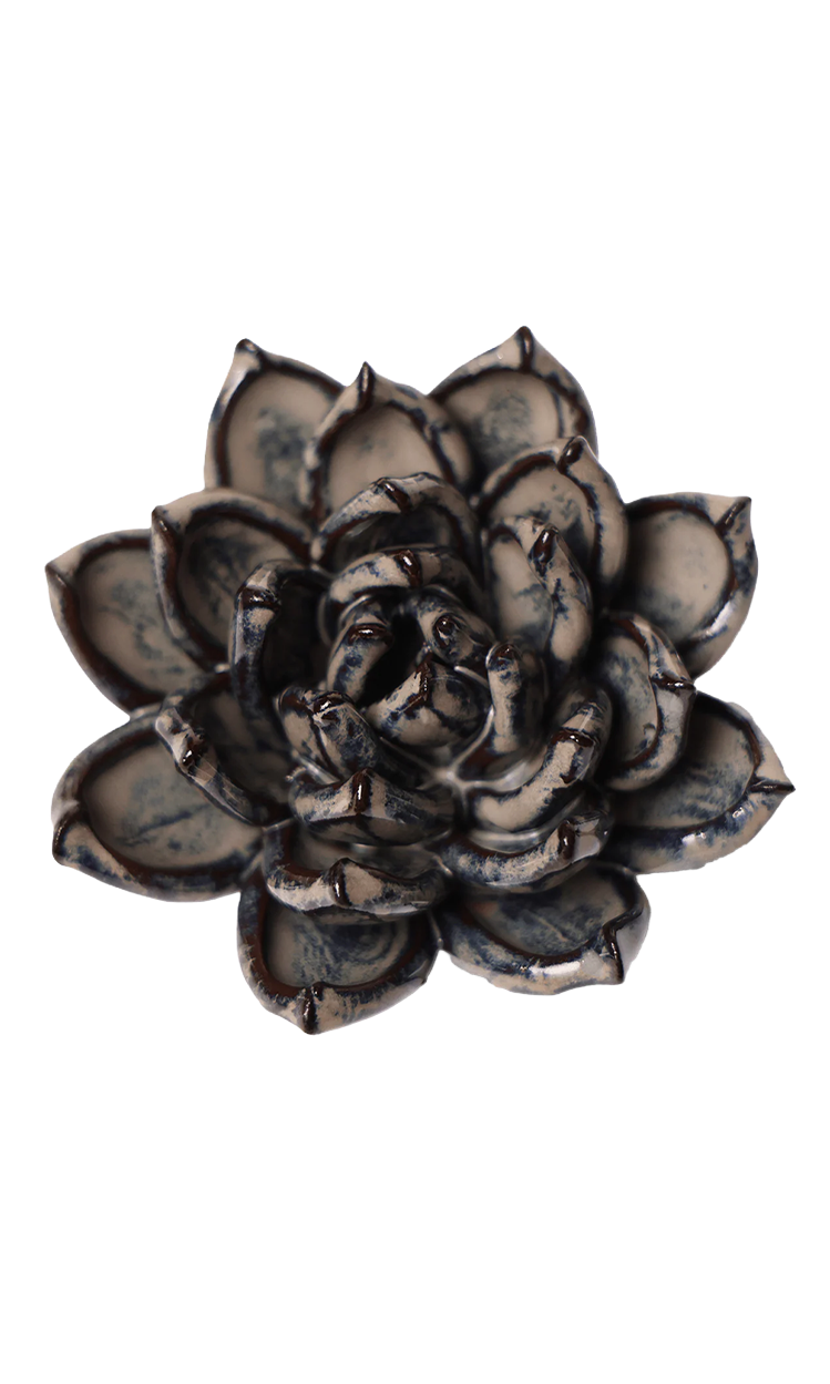 A ceramic succulent flower figurine with textured, layered petals in a dark charcoal gray and glossy glaze, isolated on a white background.