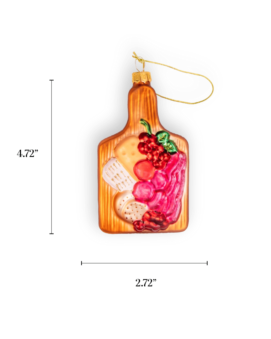 Chive glass charcuterie board ornament with cheese, grapes, and cured meat.