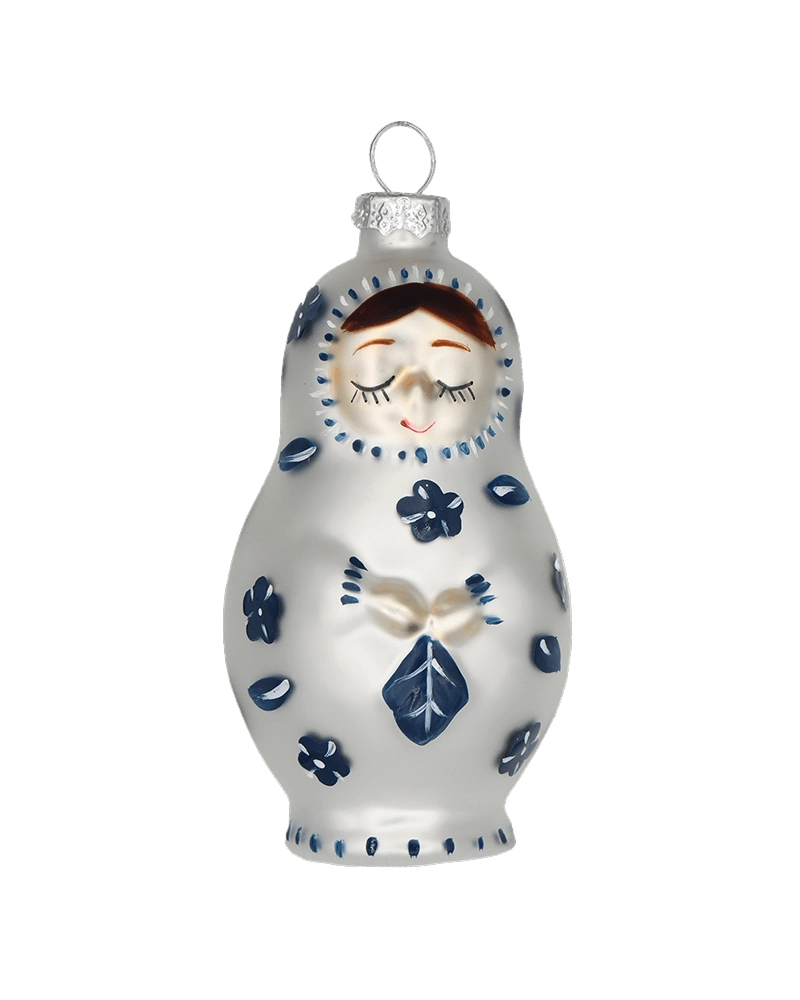 Chive glass matryoshka doll ornament shown straight-on with a painted sleeping face.