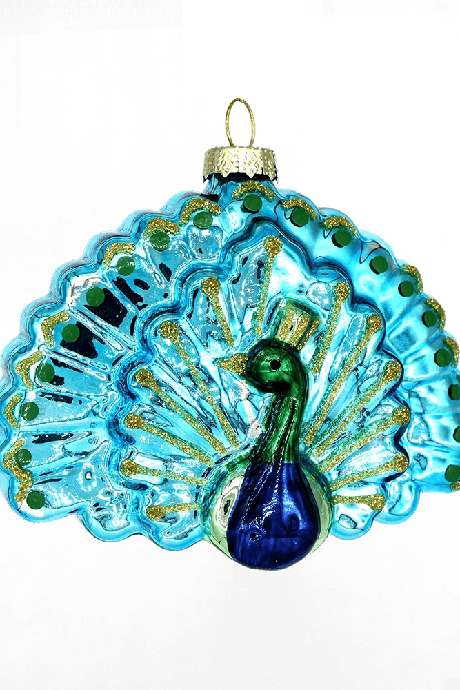Chive glass peacock ornament with a fanned turquoise tail and glittered feather eyes.