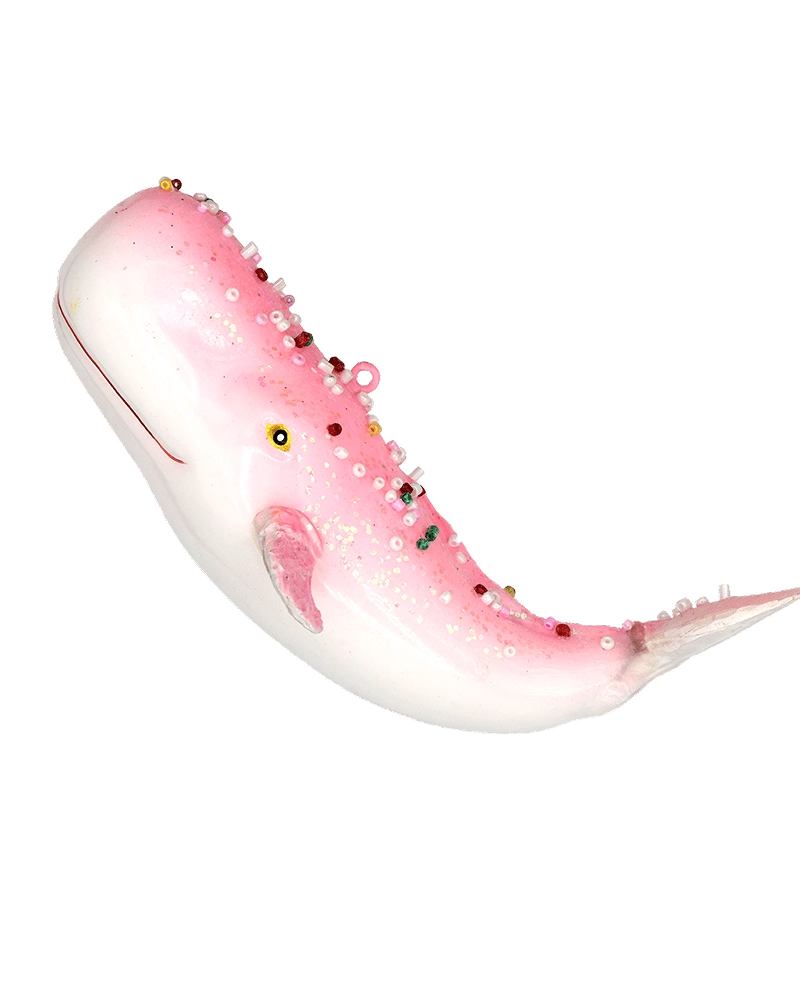 Chive glass whale ornament in pink with a jeweled beaded spine and glitter accents.