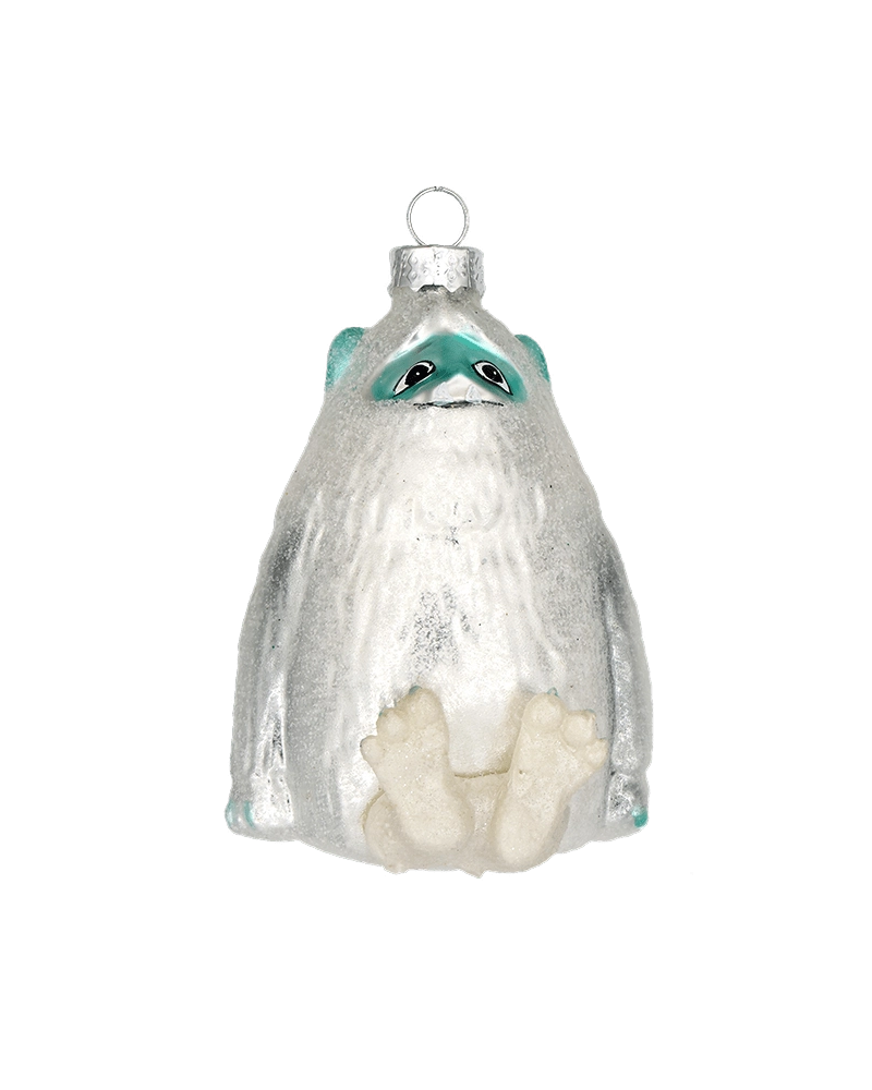 Chive glass yeti ornament in white with a teal face mask and textured fur detail.