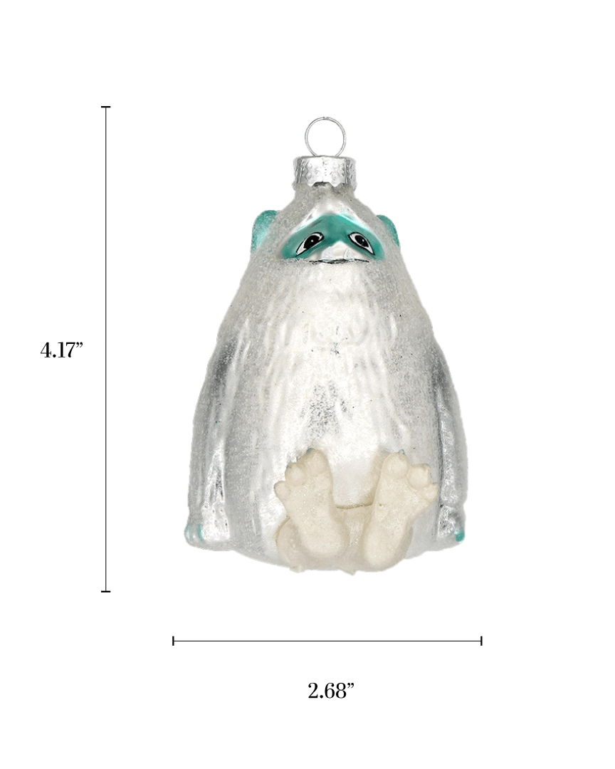 Chive glass yeti ornament with a dimension diagram showing its rounded sitting size.