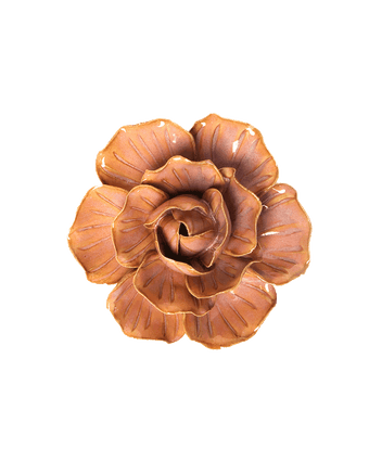A single sculptural rose-shaped decorative object in a glossy warm brown finish, centered on a plain white background.