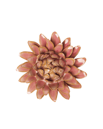 A single artificial flower head with layered petals in dusty pink, mauve, and tan tones, isolated on a plain white background.