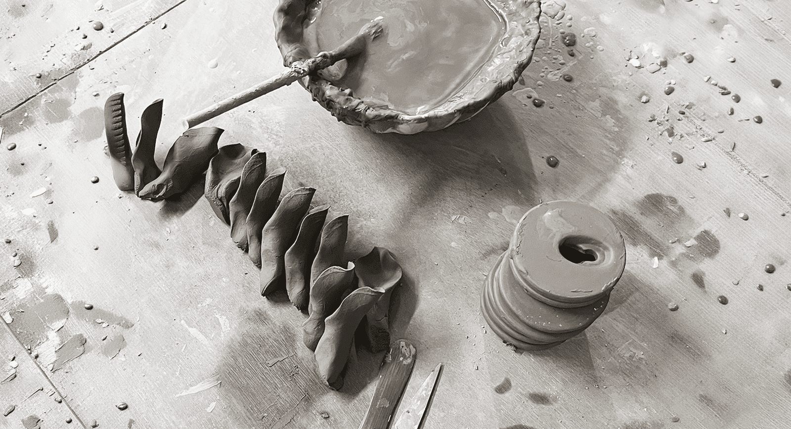 Artisan sculpting a ceramic flower by hand — Chive Studio