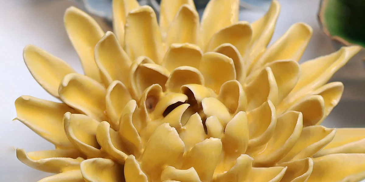 Buttercup yellow ceramic chrysanthemum wall flower — November birth flower — handmade by Chive Studio Toronto
