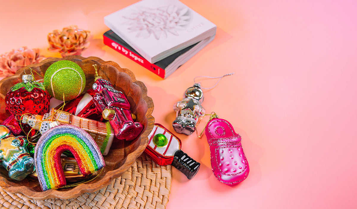 Blown glass ornaments from the Chive collection grouped together — by Chive Studio