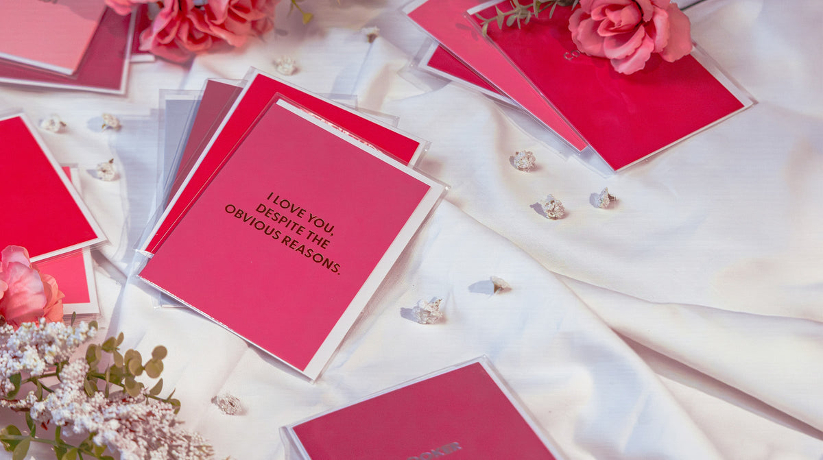 Anniversary cards and valentine designs fanned out — by Chive Studio
