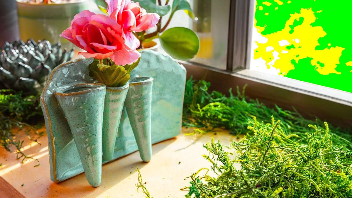Ceramic flower vase group in glazed finishes, styled with fresh flowers — by Chive Studio