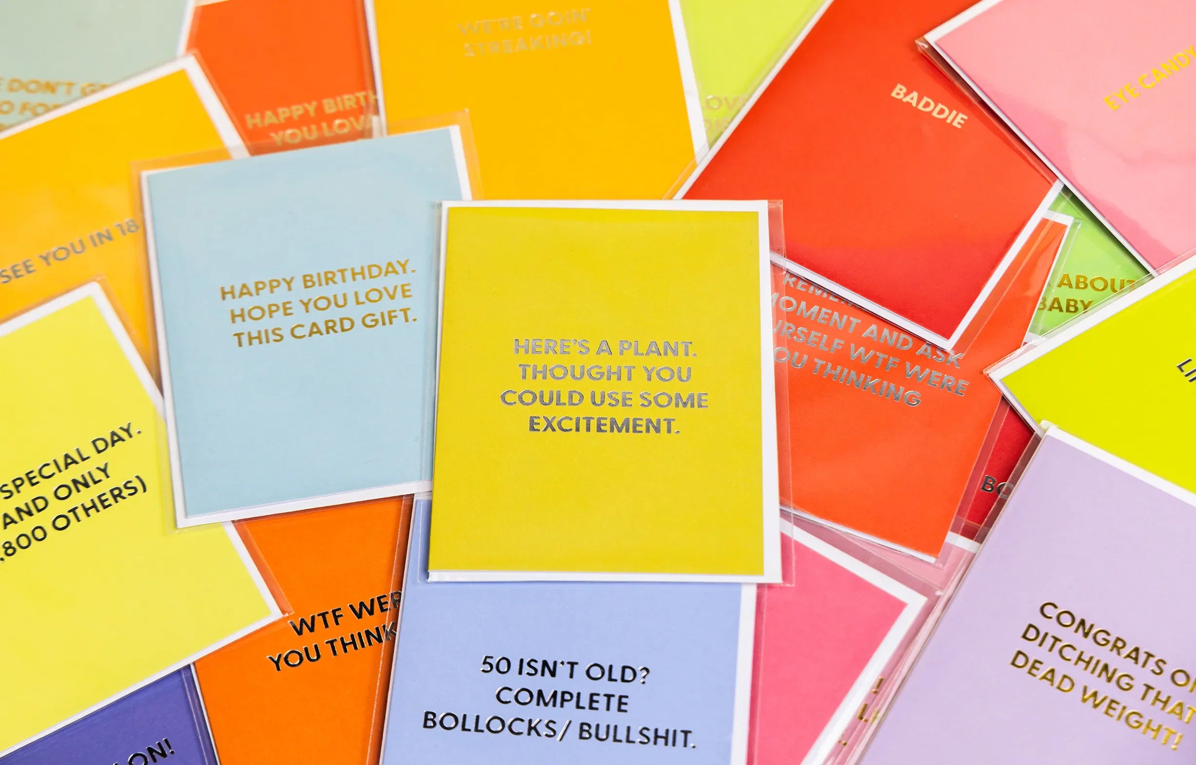 Chive's assorted letterpress greeting cards of different colors displayed together.