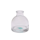 Chive Loft round glass bud vase in clear glass, shown straight-on with a smooth glossy finish.