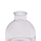 Chive Loft round glass bud vase in clear glass, close-up on the flared neck and rim.