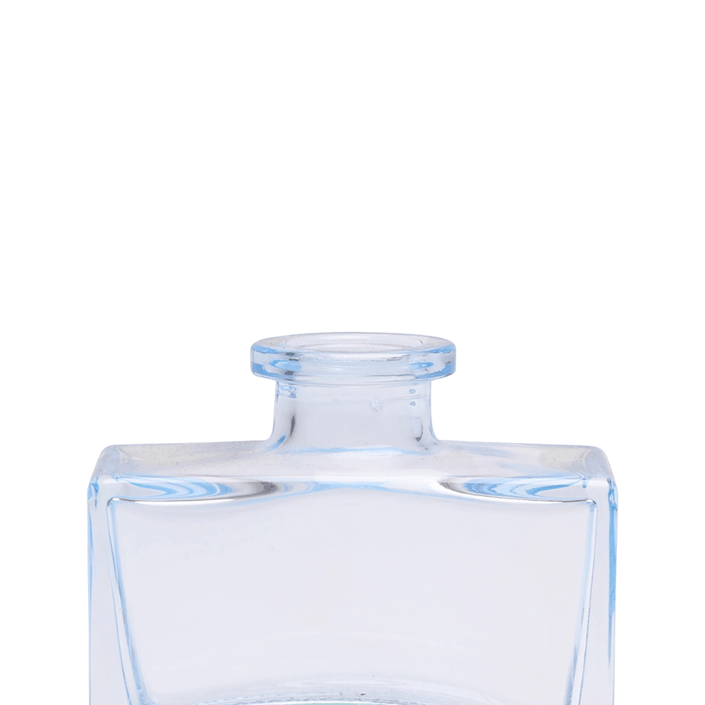 Chive Loft glass bud vase in Light Blue shows a close-up of the narrow neck and flared rim.