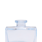 Chive Loft glass bud vase in Light Blue shows a close-up of the narrow neck and flared rim.
