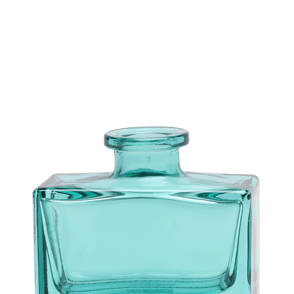 Chive Loft glass bud vase in Teal shows a close-up of the narrow neck and flared rim.