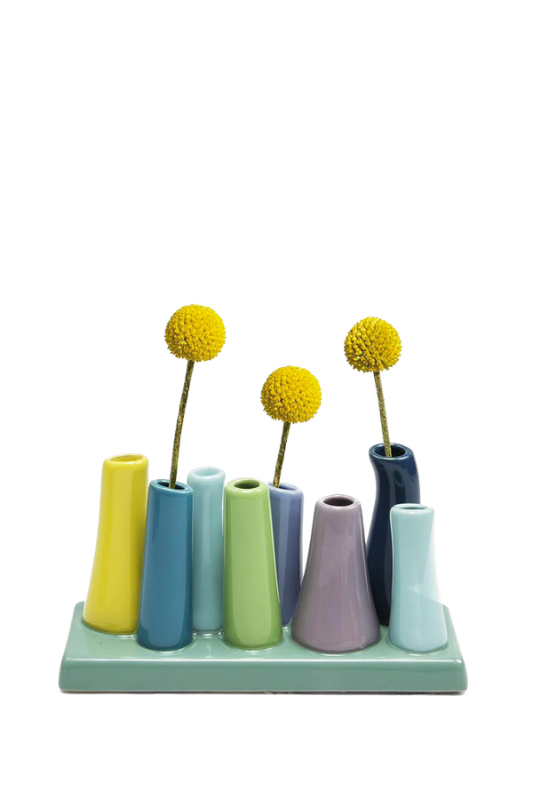 Chive's multi-stem ceramic pooley vase in color Buttercup styled with mini flowers.