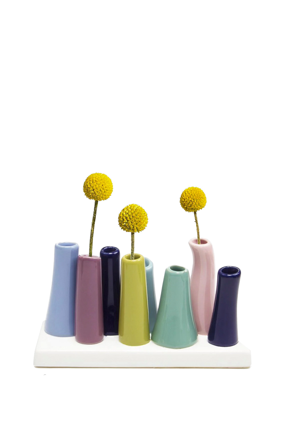 Chive Pooley ceramic bud vase set in Serenity pairs navy, mauve, and sage tubes on a connected tray.