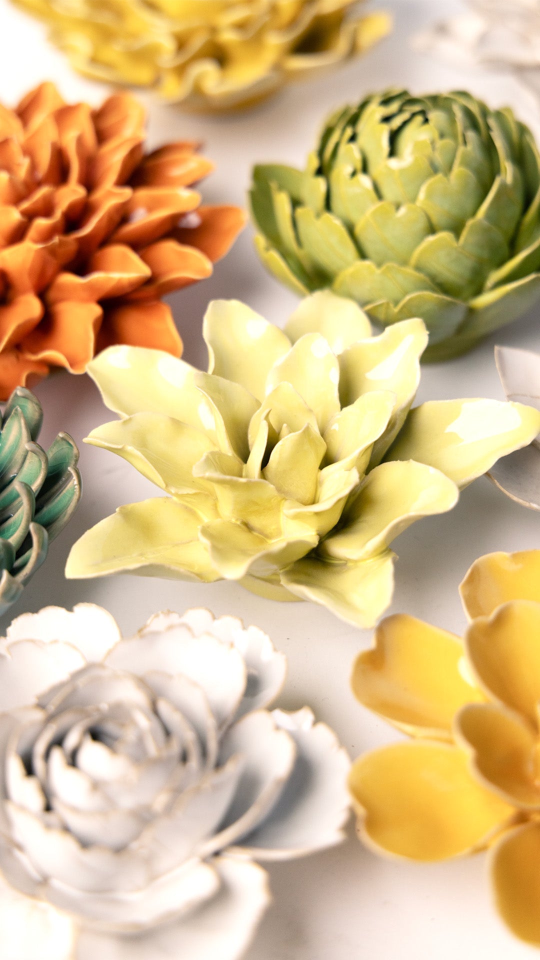 Lime Yellow Tiger Lily ceramic wall flower styled on wall — English Garden — Chive Studio Toronto