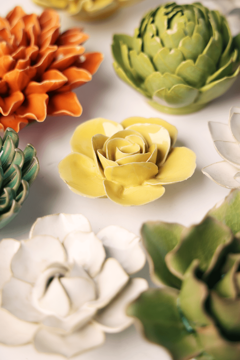 Buttercup Yellow Elegance Ranunculus ceramic wall flower styled on wall — English Garden — Chive Studio Toronto