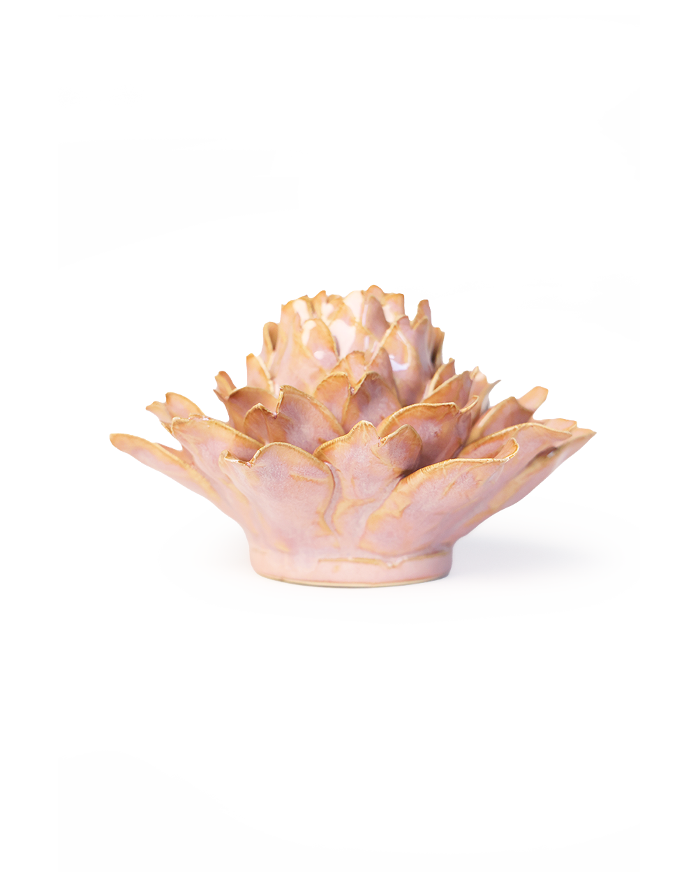 A small sculptural lotus flower vase or candle holder with layered petals, finished in a soft blush pink with metallic gold edging, photographed on a clean white background.