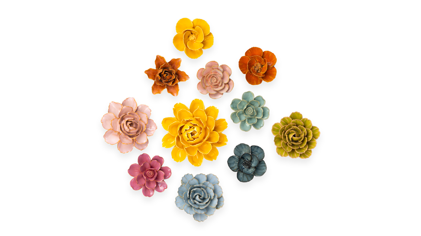 France Collection an assortment of mixed Ceramic wall flowers in orange, pink, blue, and yellow on transparent background - Chive Ceramics Studio