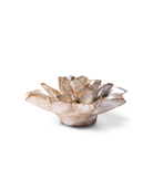 A sculptural lotus-shaped dish or candle holder made from natural mother-of-pearl shell, featuring iridescent beige and cream tones with subtle gold-brown highlights, set against a plain white background.