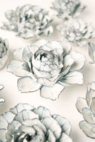 Blue White Keiko Peony ceramic wall flower styled on wall — Coastal Collection — Chive Studio Toronto
