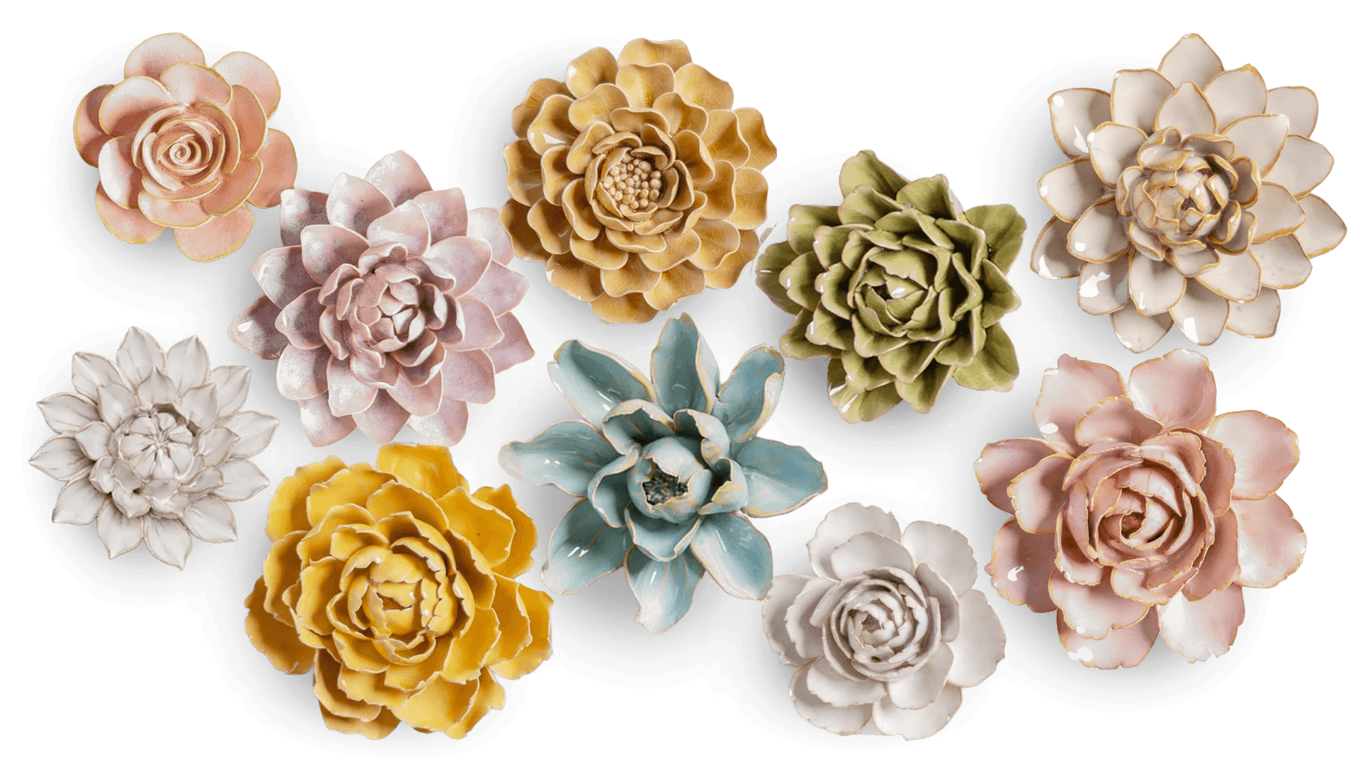 Laying out ceramic flowers before hanging to determine placement on wall
