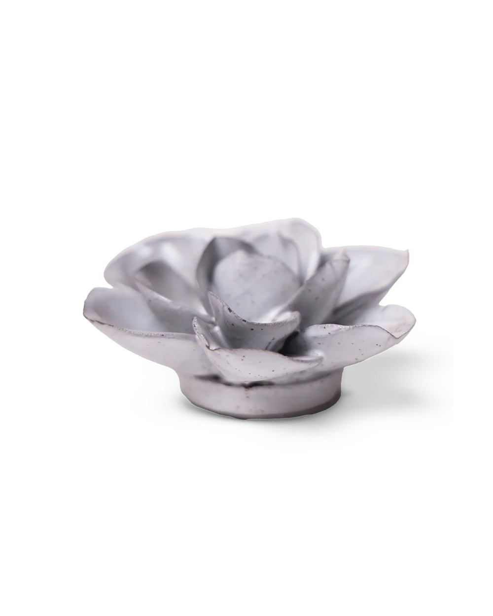 A small sculptural flower-shaped object in a matte light gray finish with subtle speckling, photographed on a clean white background.