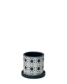 Chive Balter black lattice ceramic planter with an embossed white lace lattice pattern and matching saucer.