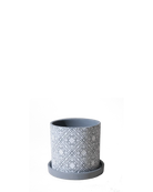 hive Balter ceramic planter in grey with an embossed medallion tile pattern and matching saucer.