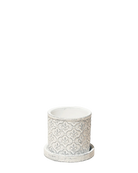 Chive Balter ceramic planter in white with an embossed fleur-de-lis pattern and matching saucer.