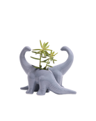 Two Chive Brontosaurus cloud blue color glazed ceramic dinosaur shaped planters styled with a plant.