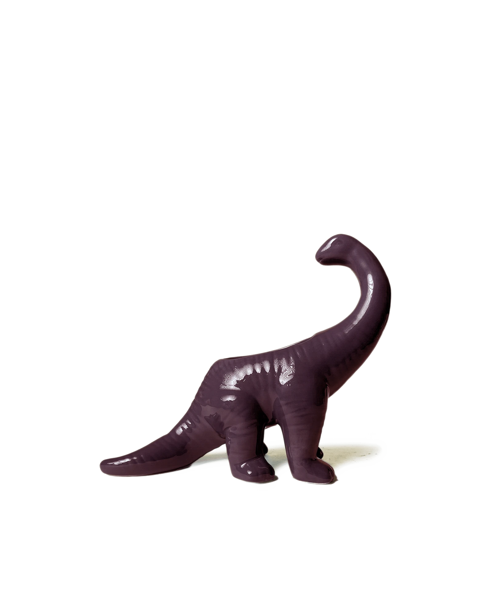Chive Brontosaurus purple color ceramic dinosaur shaped succulent planter with no drainage.