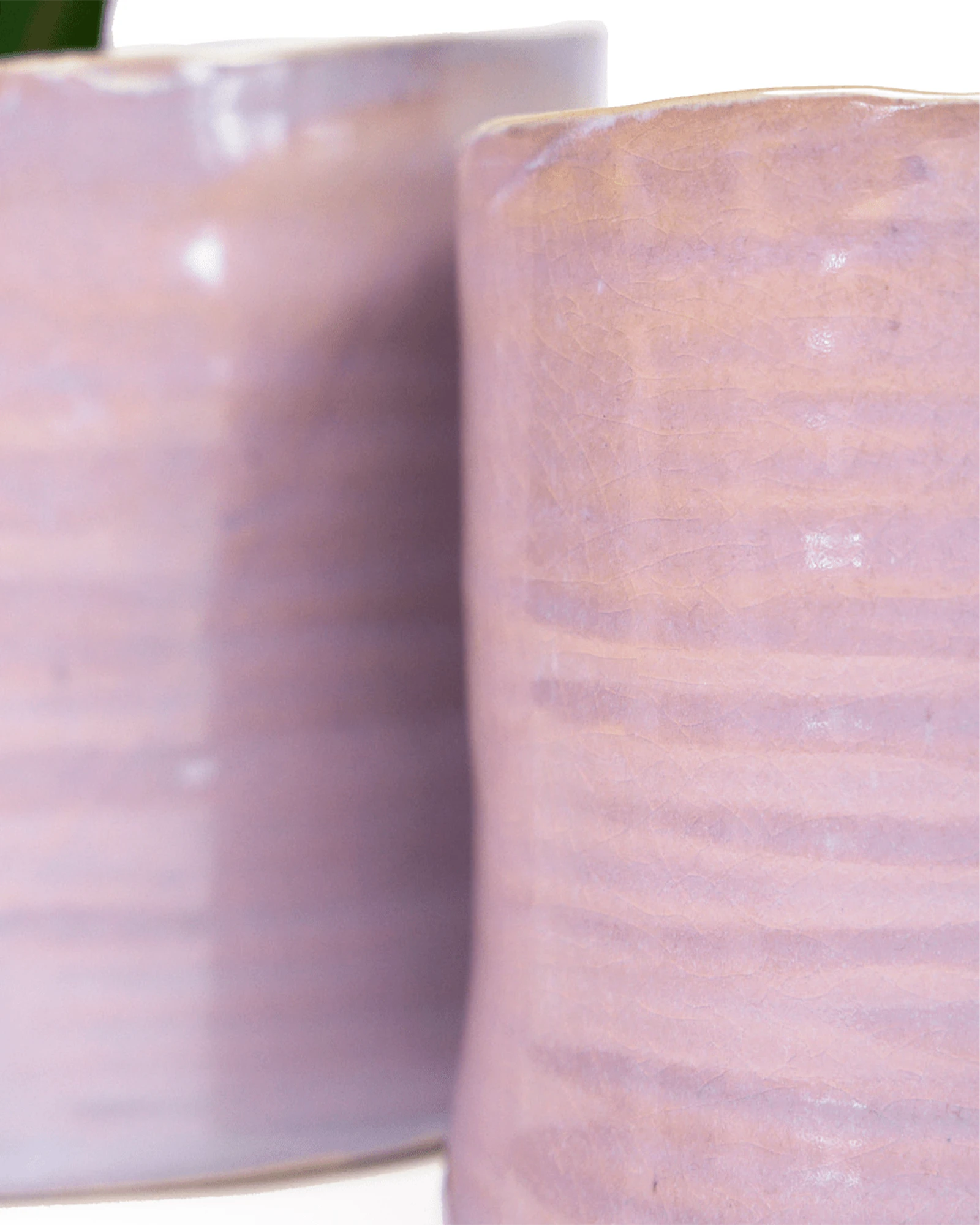 Close-up of the glaze finish on a Chive Channa mauve ceramic medium planter pot.