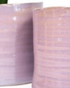 Close-up of the glaze finish on a Chive Channa mauve ceramic medium planter pot.