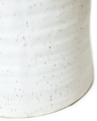 Close-up of the speckles pattern and glaze finish on a Chive Channa white speckles ceramic medium pot.