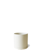Chive Dojo ceramic planter in warm sandstone with a smooth matte finish and matching detachable saucer.