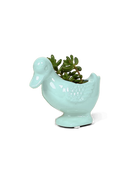 Chive Duck Seafoam color glazed ceramic duck shaped planter styled with a small plant.