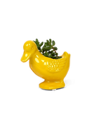 Chive Duck Yellow color glazed ceramic duck shaped planter styled with a small plant.