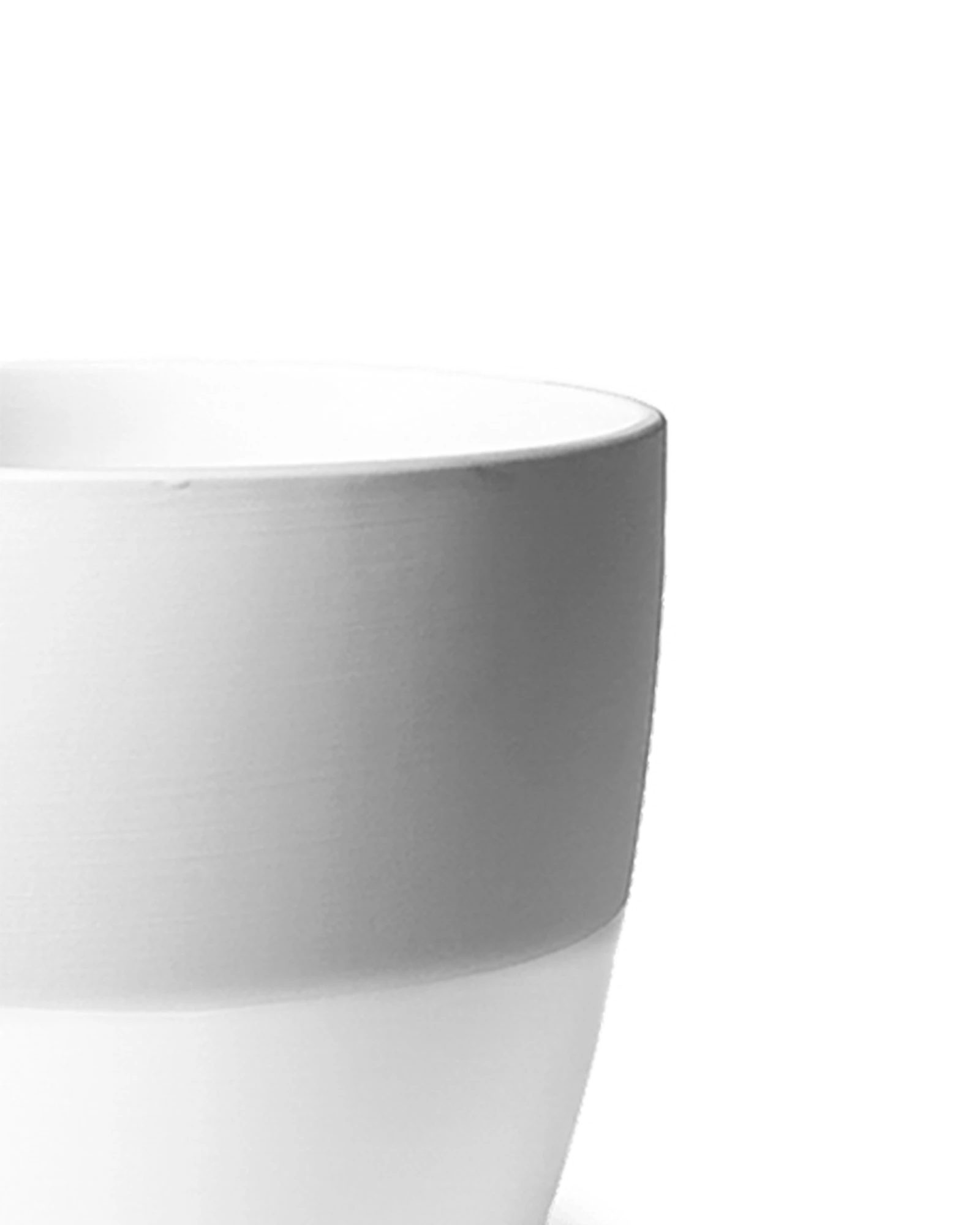 Close-up of the Chive Dyad small light grey porcelain pot showing the surface texture and finish.