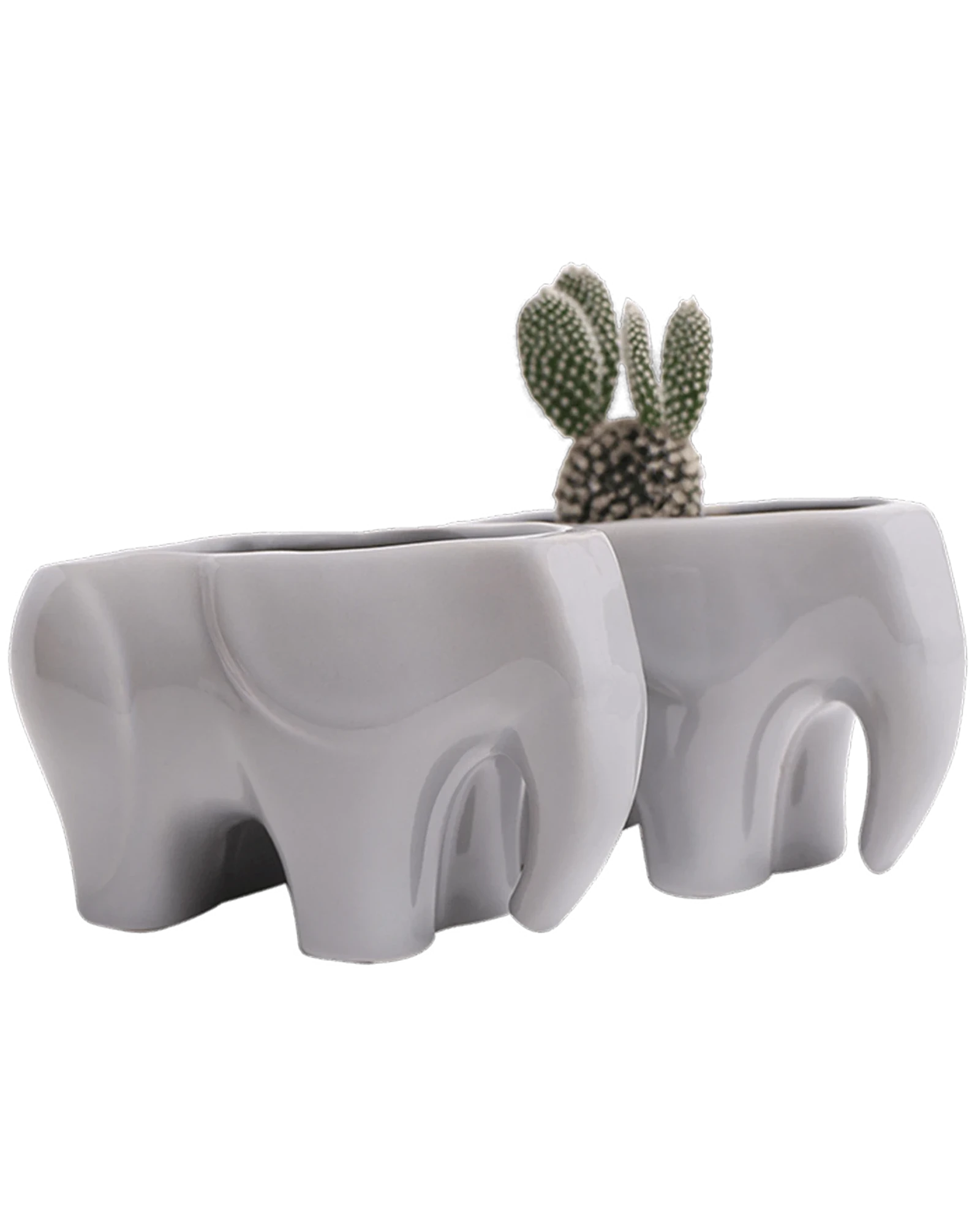 Two Chive Elephant Grey color glazed ceramic elephant shaped planters styled with a cactus.