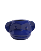 Front view of Chive Funky Monkey Blue ceramic monkey shaped succulent planter with no drainage.