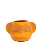 Front view of Chive Funky Monkey Orange color ceramic monkey shaped succulent planter with no drainage.
