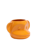 Chive Funky Monkey Orange color ceramic monkey shaped succulent planter with no drainage.