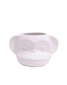 Front view of Chive Funky Monkey White ceramic monkey shaped succulent planter with no drainage.