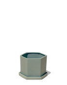 Chive Hexi peacock green matte ceramic medium hexagonal planter with matching saucer.